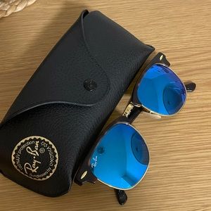 Ray-Ban sunglasses with blue lenses and tortoise shell detail